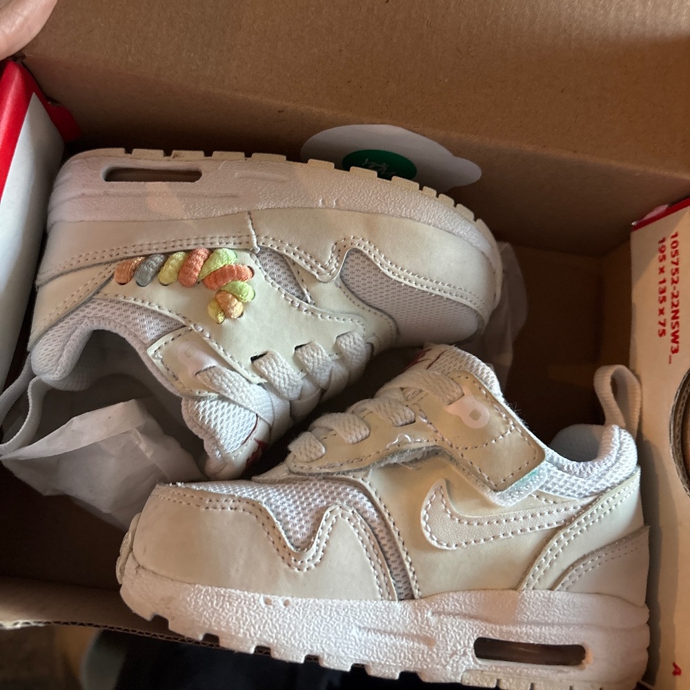 Nike Kids White Sneakers with Pastel Rainbow Stitching